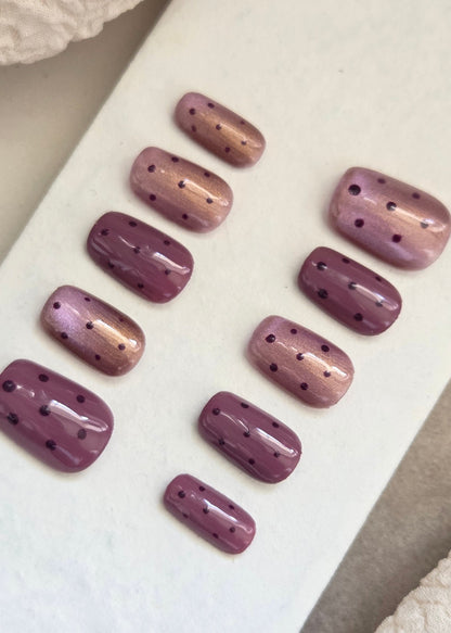 Mulberry Muse mauve and purple shimmer press-on nails with polka-dot detail