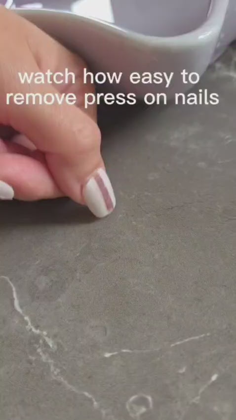 Load video: Step-by-step tutorial showing how to gently remove Rosie Posie press-on nails.